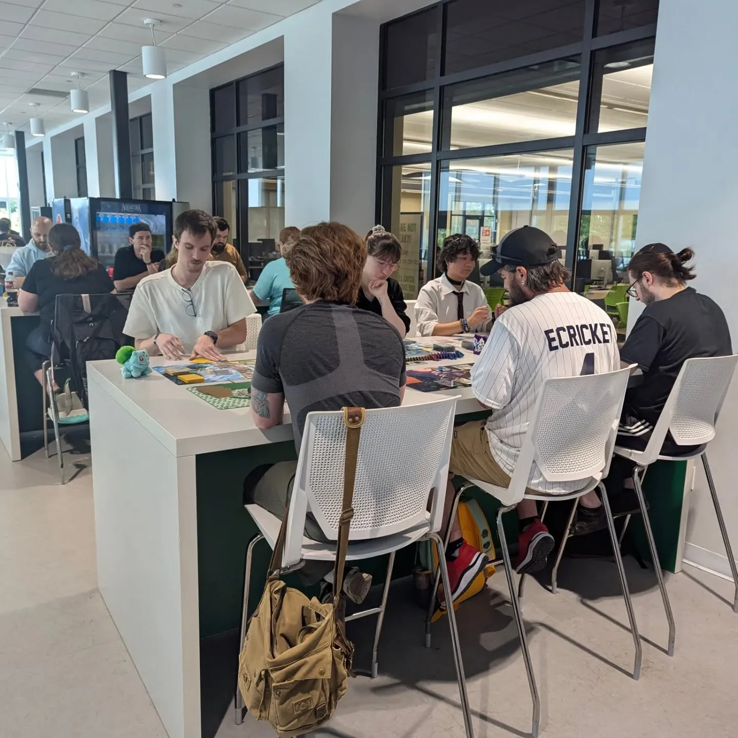 The Summoning Convention 2025 -group gaming at the counter